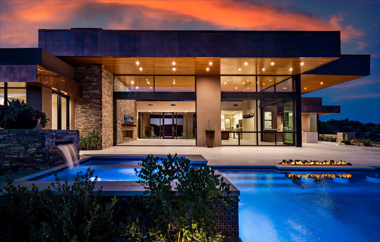 Pool and waterfall at twilight