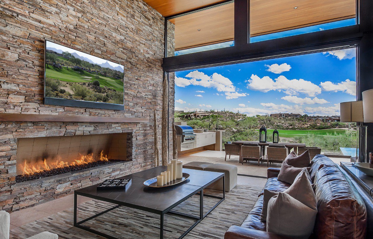 Stone fireplace with desert views