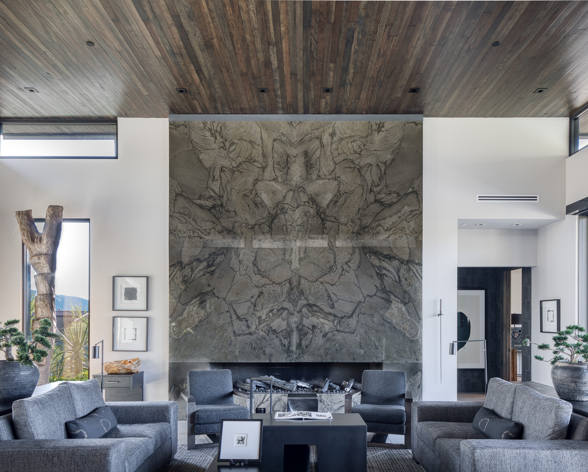 Mono living room with stone fireplace